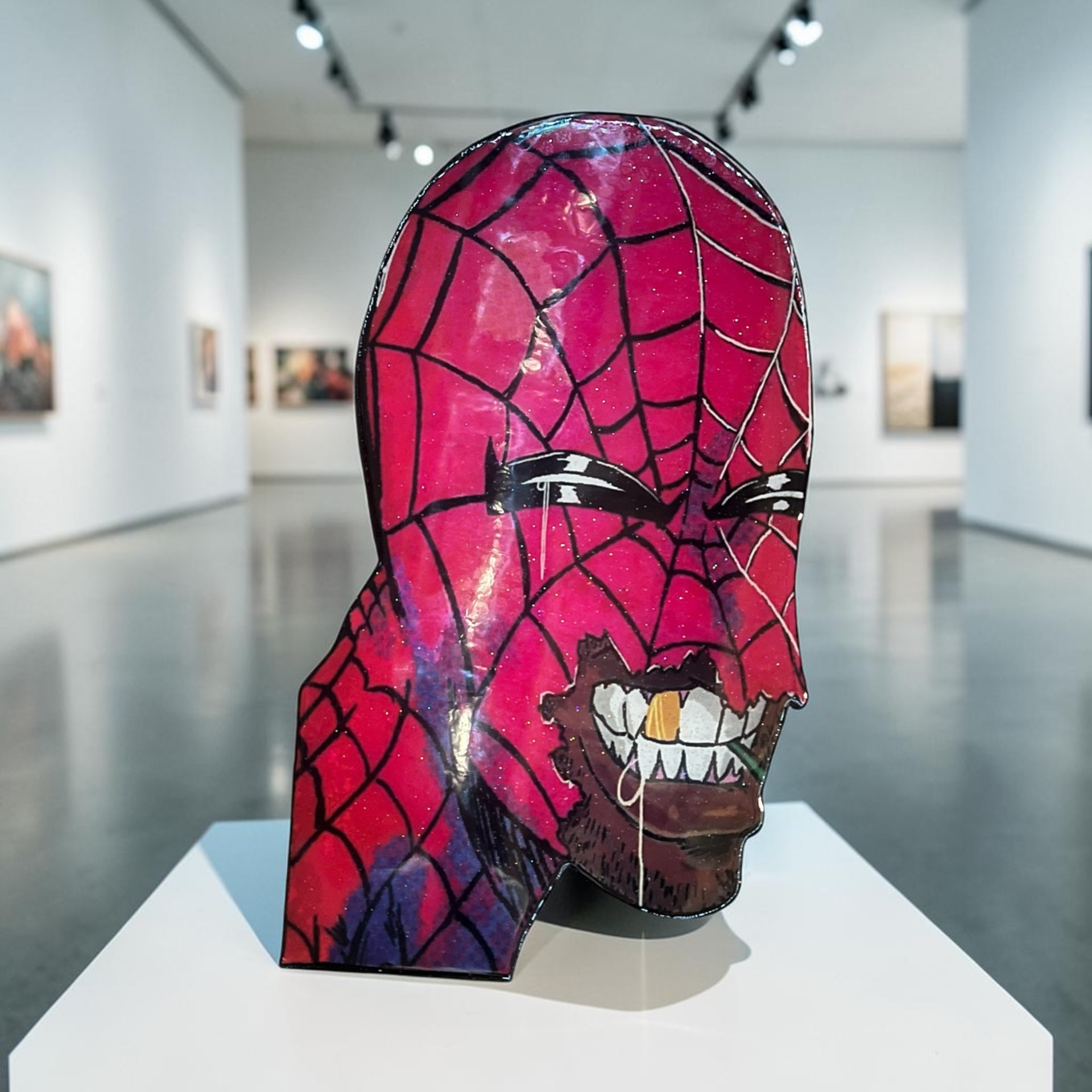 Custom hand cut Spider-Man epoxy wood wall piece with red web pattern and glossy resin finish