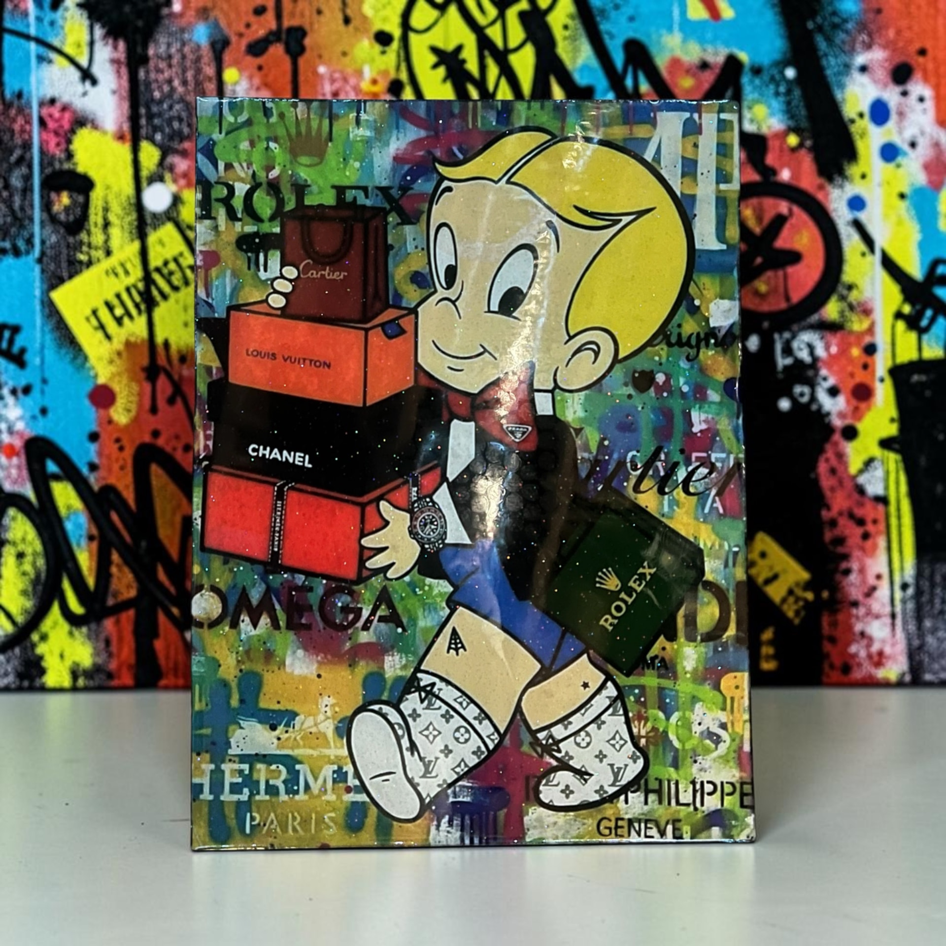 Custom hand cut and epoxy on wood featuring a Richie Rich style cartoon character surrounded by luxury designer boxes