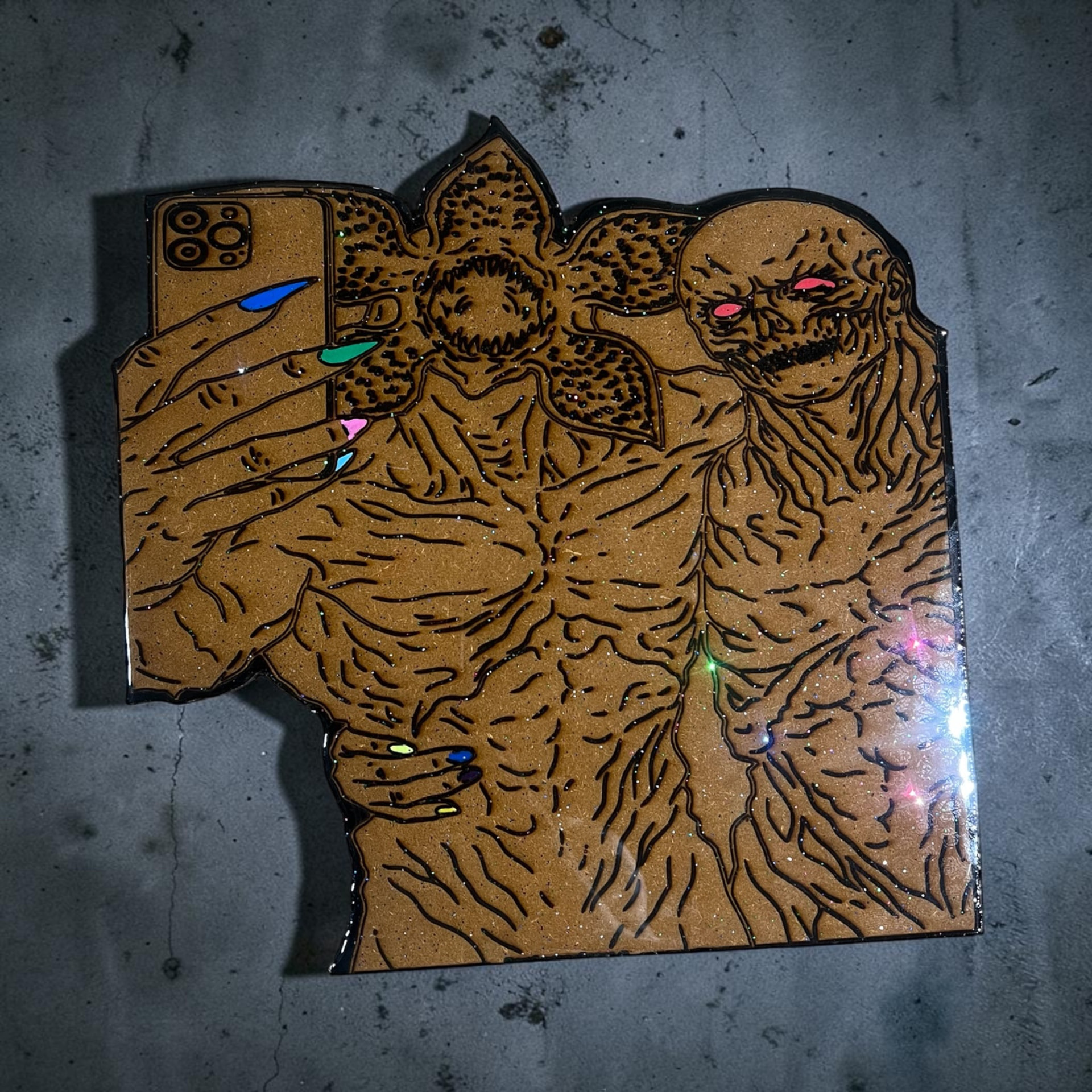 Custom hand-cut, laser engraved, painted, and epoxy Demogorgon mirror selfie wall art on wood