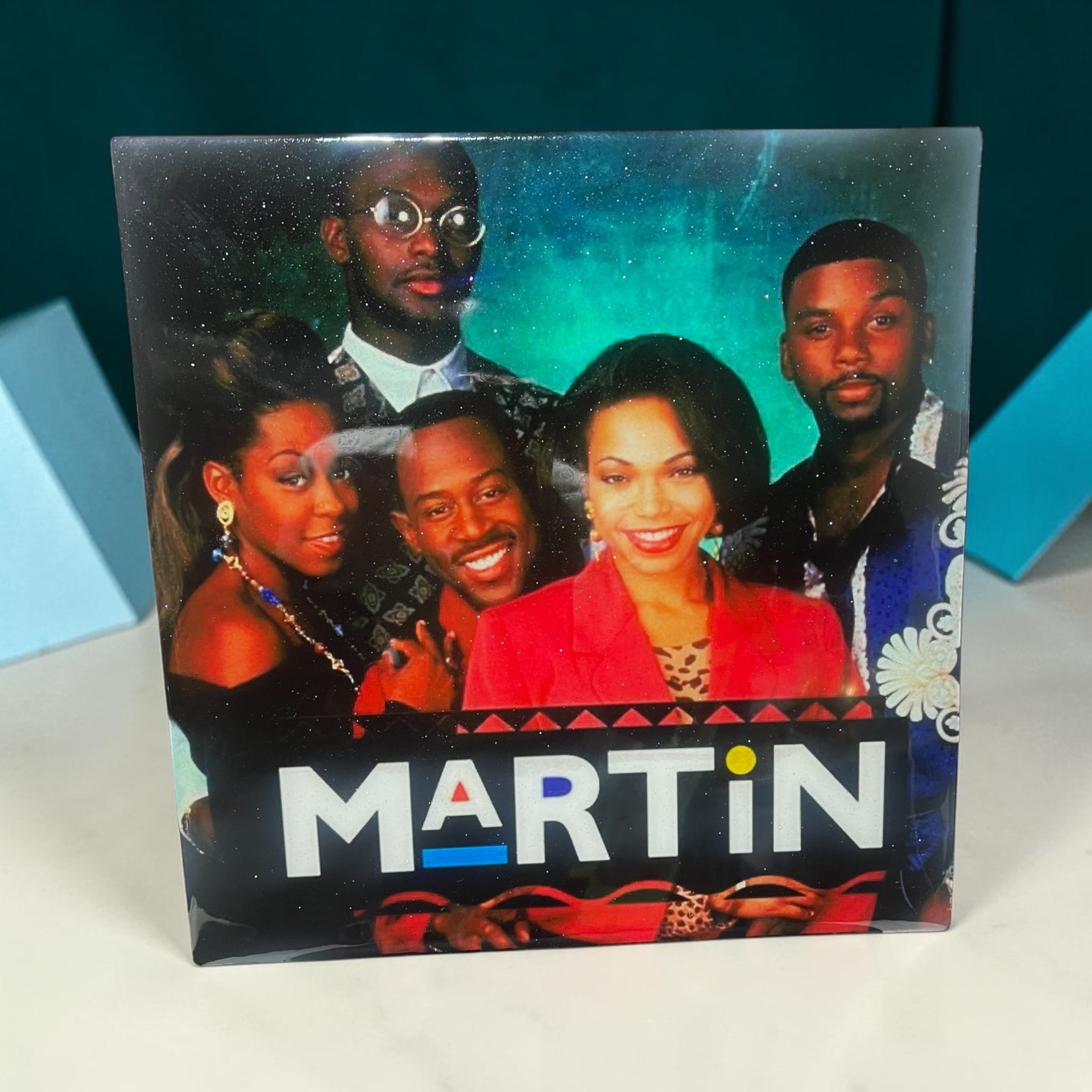 Custom hand-cut and epoxy Martin TV show cast wall art on wood with glossy resin finish